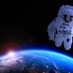 An astronaut in outerspace above Earth